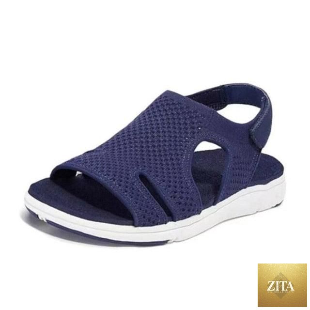 Blue casual women’s summer sandals by Stevvex with buckle strap, open toe, slip-on flat design, perfect for beach or dressy casual wear.