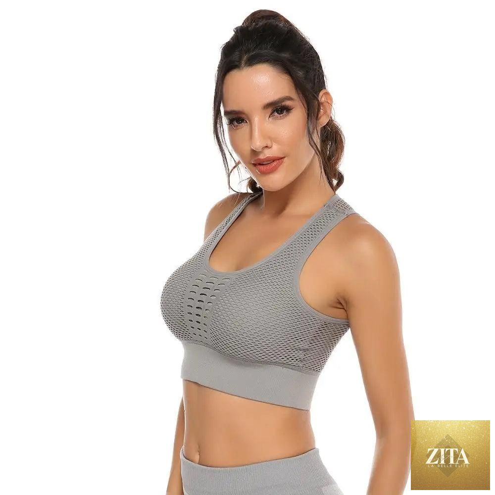 Stevvex women's workout T-shirt and sports bra set with backless design, quick-dry fabric, perfect for yoga and gym activities.
