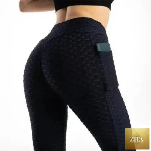 Stevvex women's high-waist fitness leggings with pockets, push-up design, ideal for running and gym workouts.