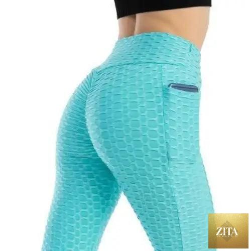 Stevvex women's high waist fitness leggings with pockets, designed for workouts, running, and gym activities, black color.