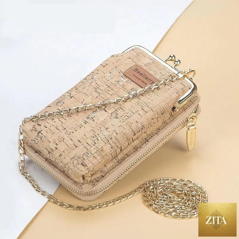 Elegant genuine leather handbag by Stevvex, large capacity multifunctional crossbody bag with phone and wallet compartments for women.