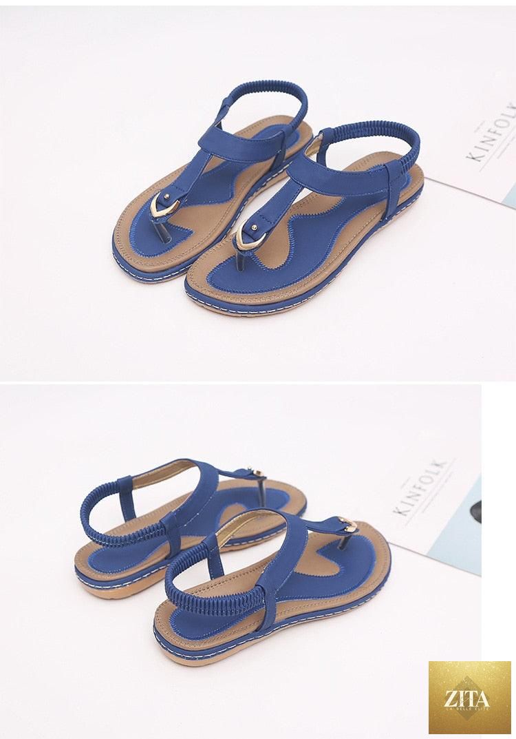 Stevvex women's flat heel summer sandals with T-strap, elastic straps, soft sole, perfect for beach and casual wear.