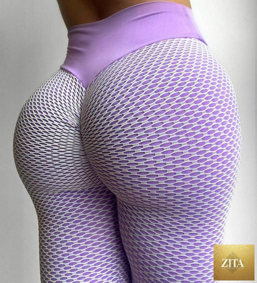 Stevvex high-waisted yoga leggings for women, thick, elastic, seamless, push-up design, fitted for active fitness and stretching.