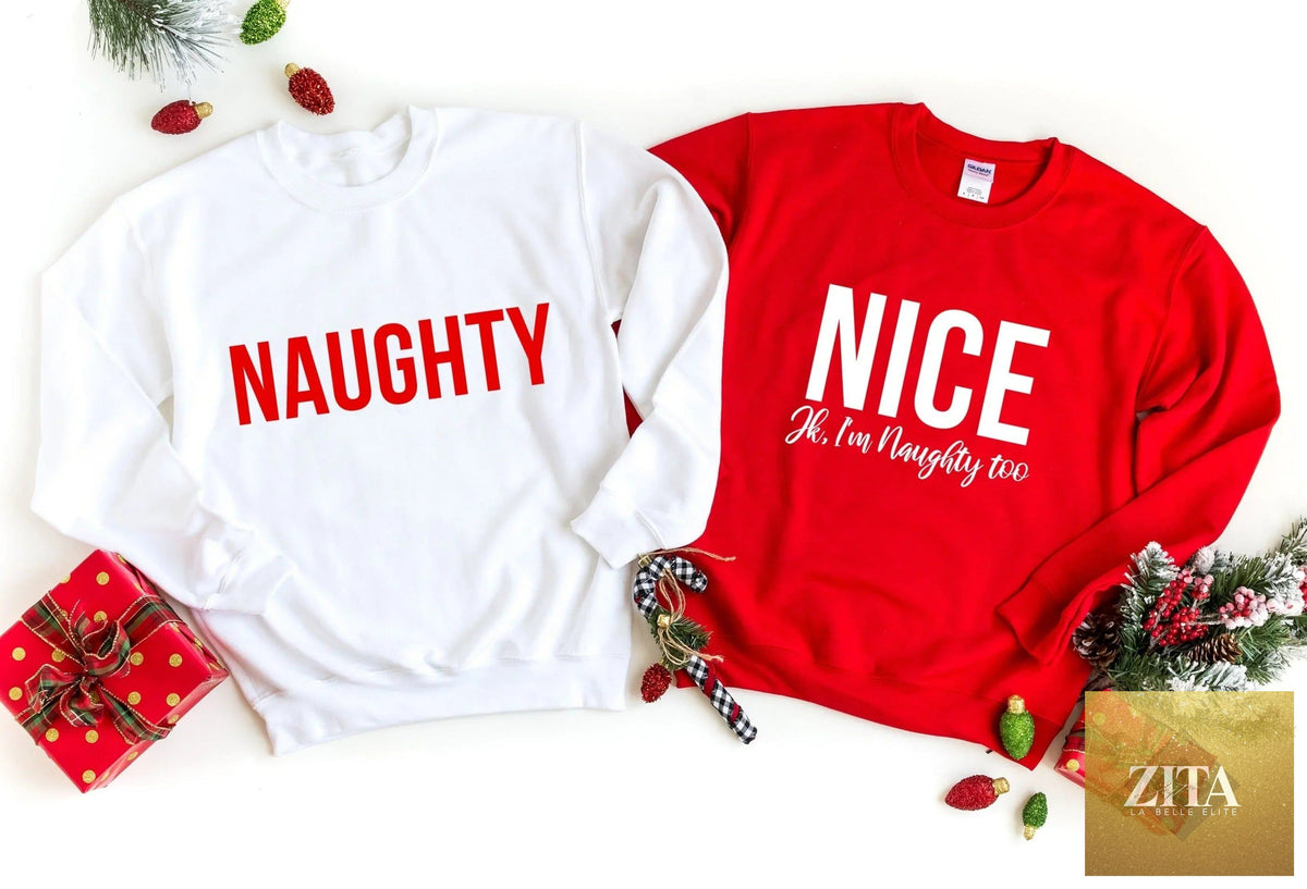 Black sweatshirt from Adorb Custom Tees with playful "Nice, Jk I'm Naughty Too" graphic, casual and comfortable fit.
