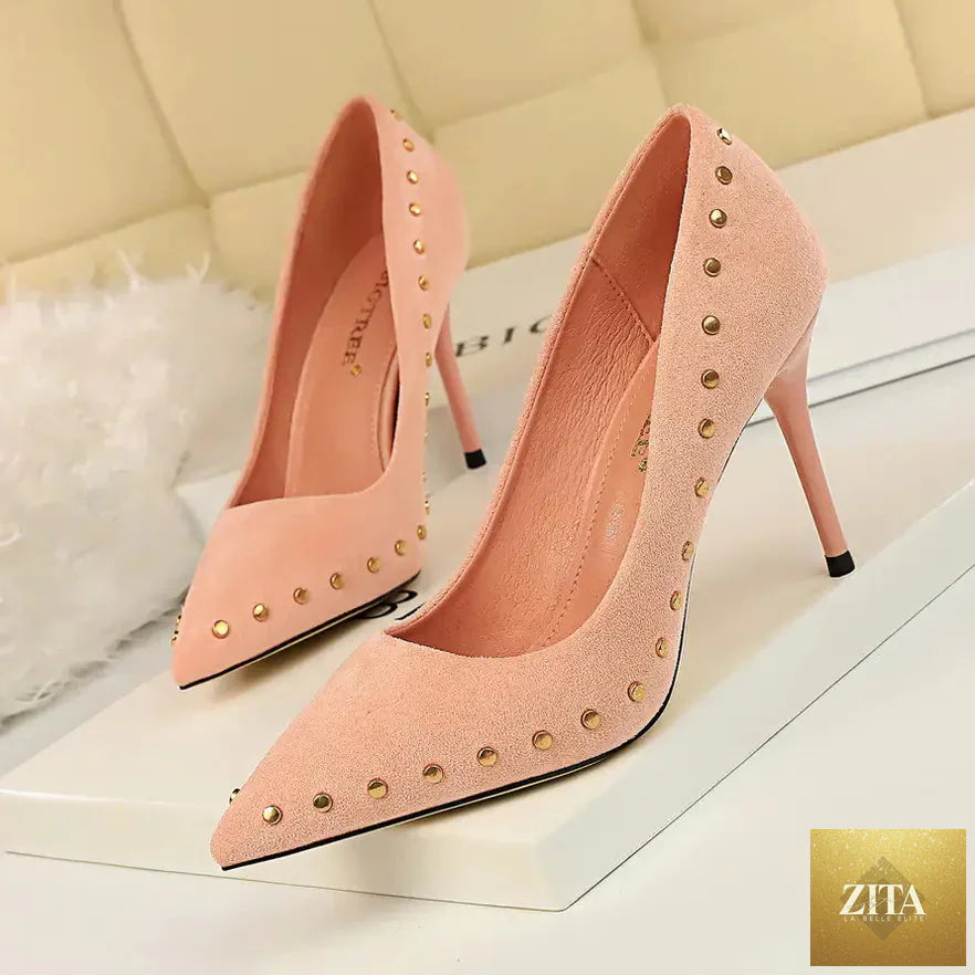 Vintage women's high heels with pointed toes and stud accents, stylish women's shoes from Trendy Attic Store01.