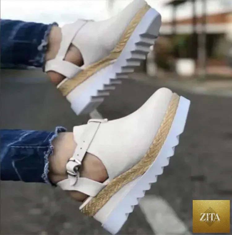 Wedge heel platform women's shoes with beige straps and chunky soles, stylish and comfortable for casual wear.