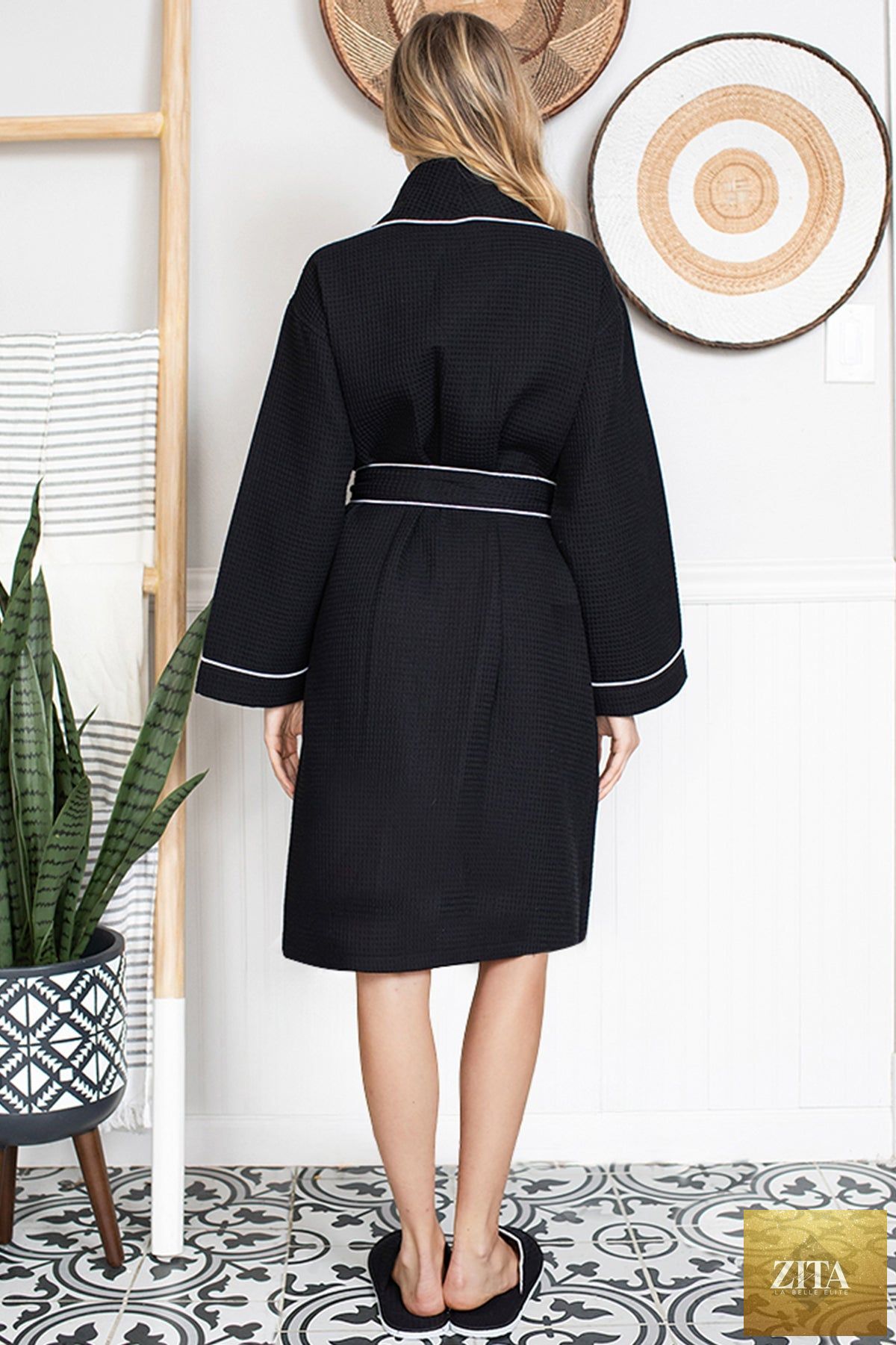 Knee-length waffle robe for women by Lotus Linen, featuring soft, textured fabric and a comfortable fit for lounging.
