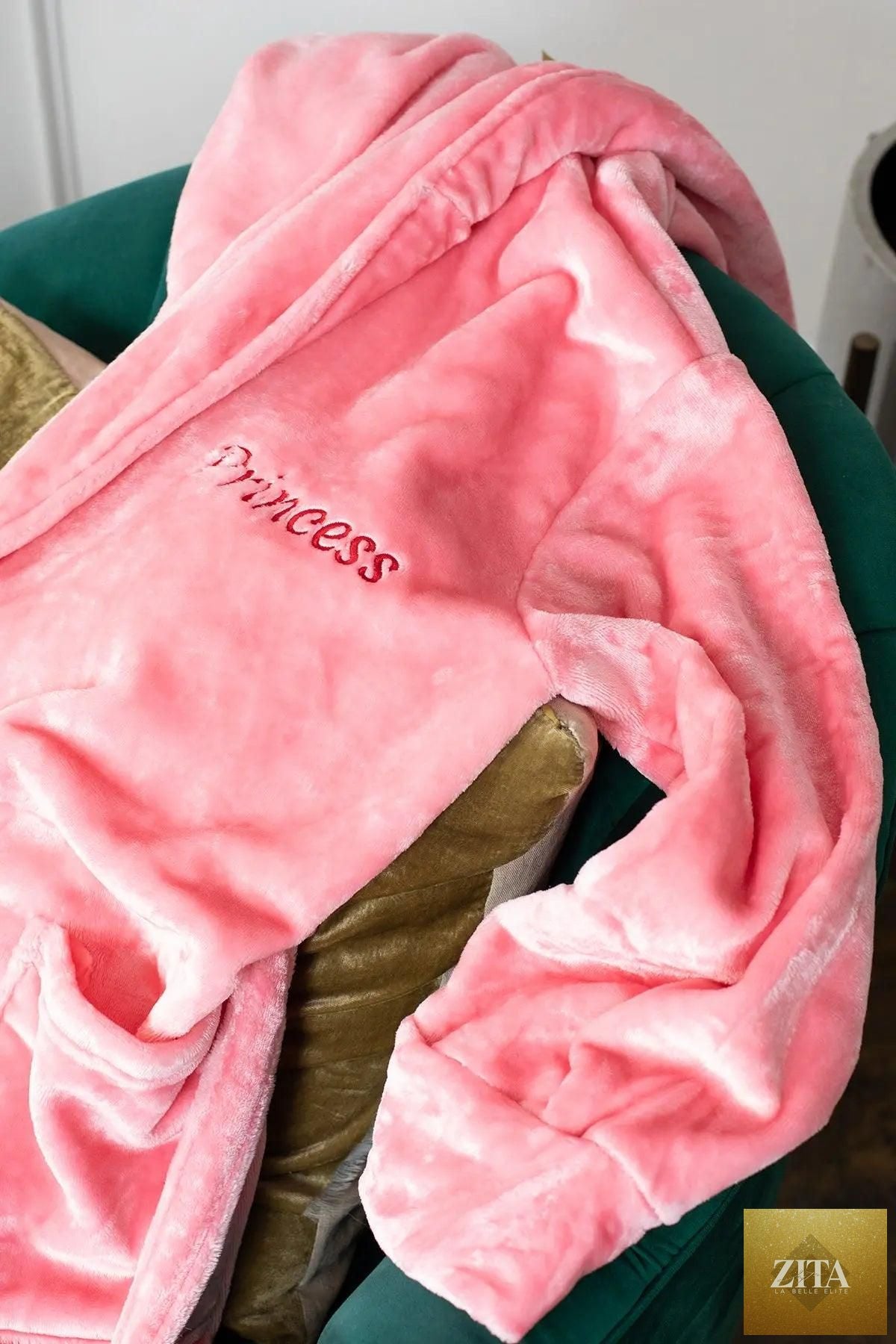 Women’s plush hooded robe by Lotus Linen featuring soft fabric and a cozy hood, perfect for relaxing at home.