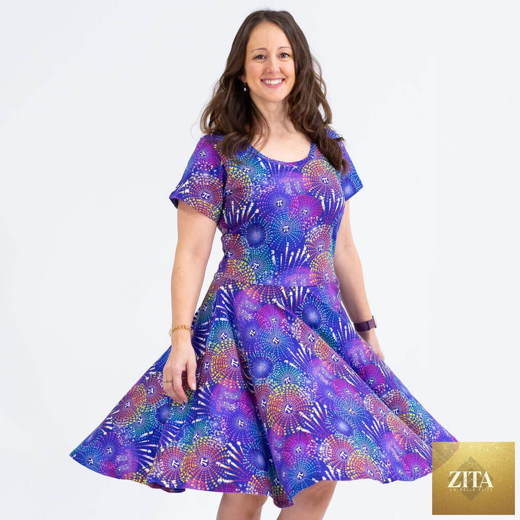 Adult Pi-rotechnics Pi Fireworks Super Twirler Dress with Pockets by Princess Awesome & Boy Wonder, featuring a colorful fireworks pattern.