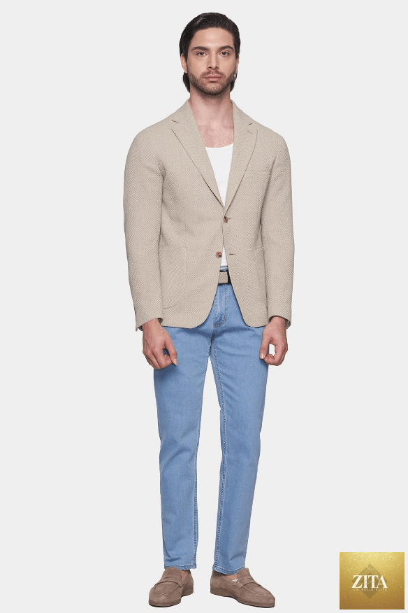 Lightwash classic jeans by Bright Moons featuring a relaxed fit and traditional five-pocket design, displayed on a hanger.