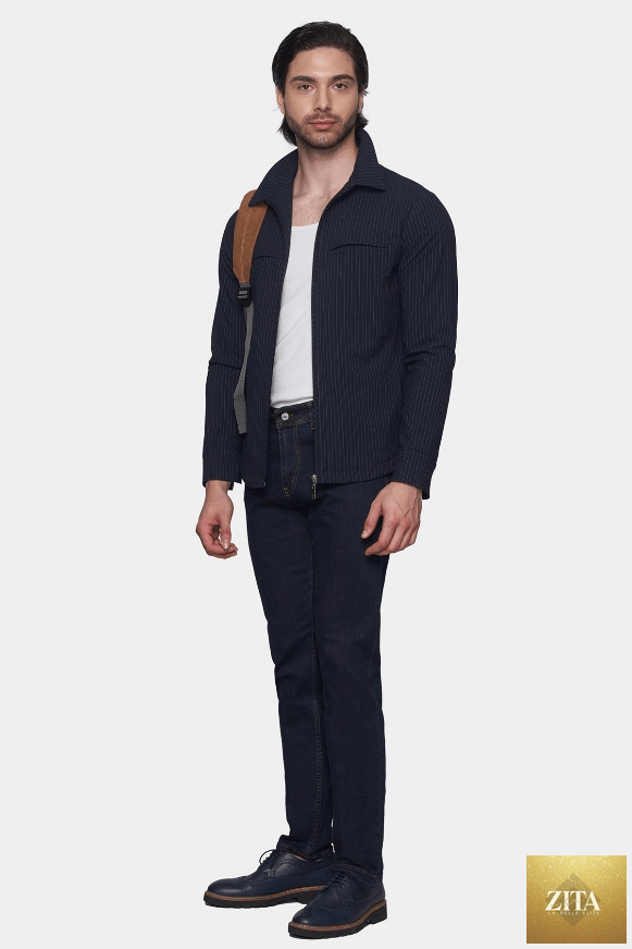 Black classic jeans by Bright Moons, showing a close-up of the denim fabric and tailored fit.