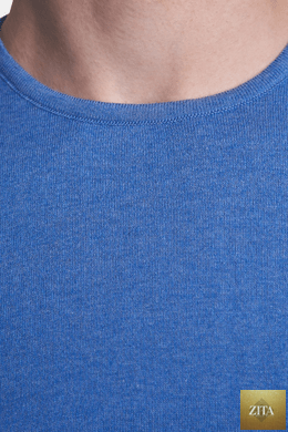 Bright Moons The Essential Shirt in classic blue, showing a casual long-sleeve shirt with collar and button front, laid flat.