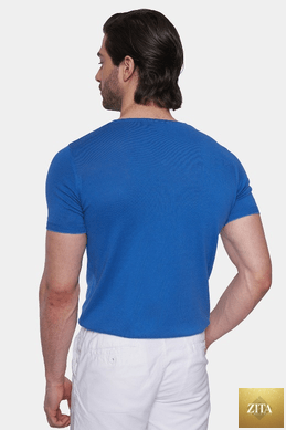 Marine blue Bright Moons Essential Shirt displayed on a hanger, showcasing its classic fit and smooth fabric.