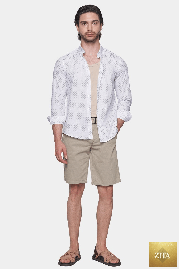 Natural beige Bright Moons summer shorts with a relaxed fit, shown on a model against a neutral background.