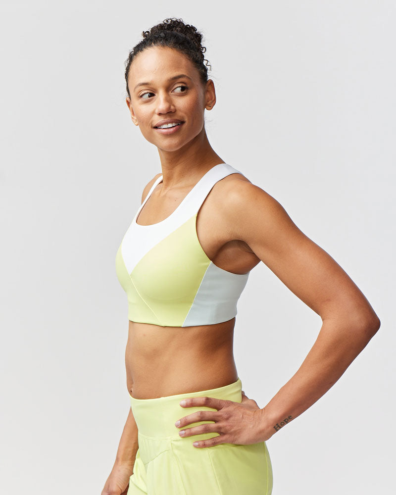 Goal Five Pionxr Bra Top for training, lime color, side view showing supportive fit and breathable fabric.