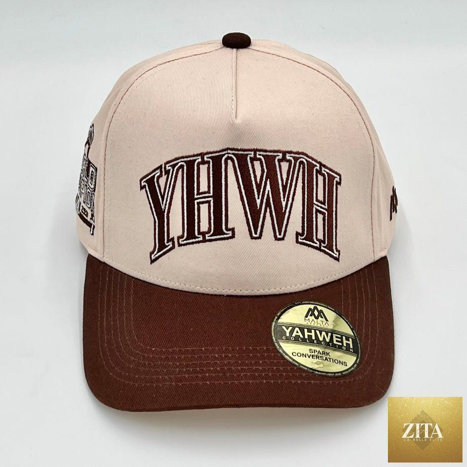 Cream and brown Malta Apparel 'YHWH' structured snapback hat with a curved brim and front logo embroidery.