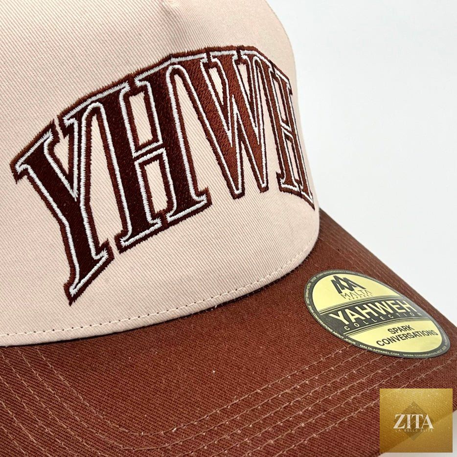 Cream and brown Malta Apparel YHWH structured snapback hat with a curved brim and adjustable snapback closure.