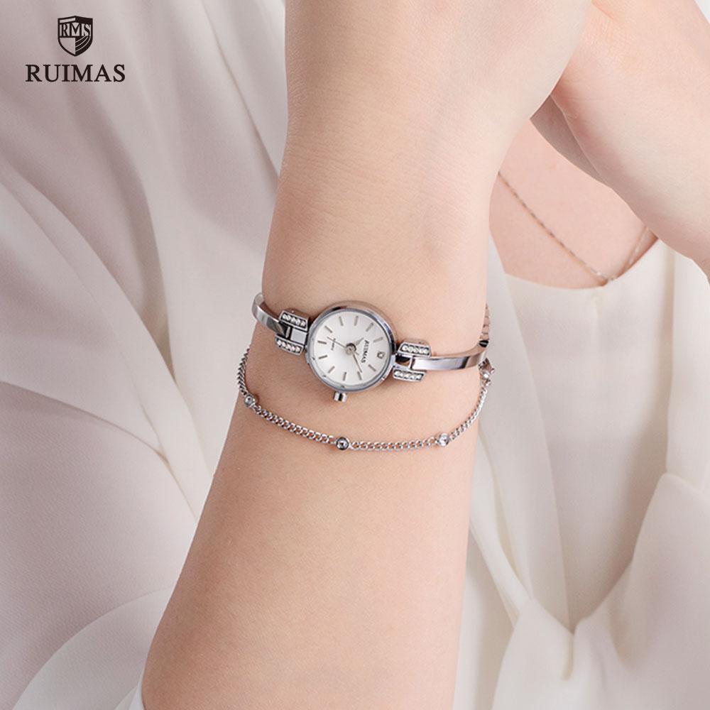 Stevvex luxury silver women’s bracelet wristwatch with mini round face, quartz movement, waterproof design, modern style.