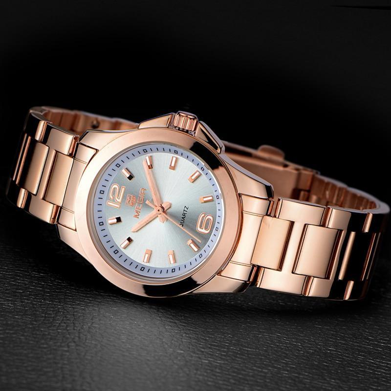 Elegant Stevvex women's gold rose wristwatch with modern waterproof design and stylish analog display.