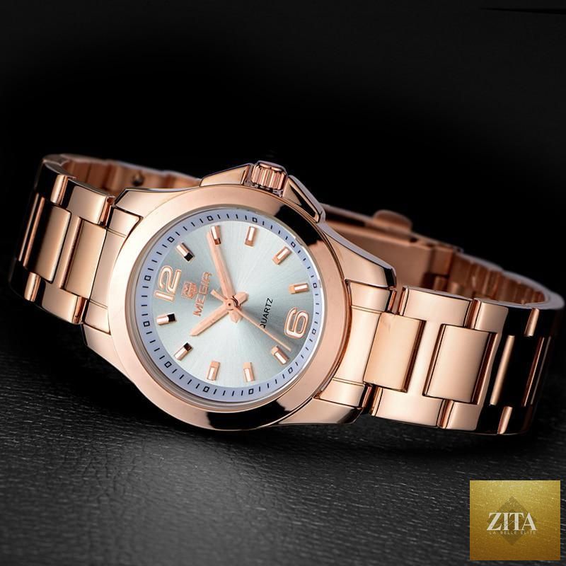 Elegant Stevvex women's gold rose wristwatch with modern waterproof design and stylish analog display.