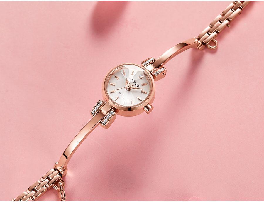 Stevvex luxury small silver women's wristwatch with modern bracelet design, mini round face, waterproof quartz movement.