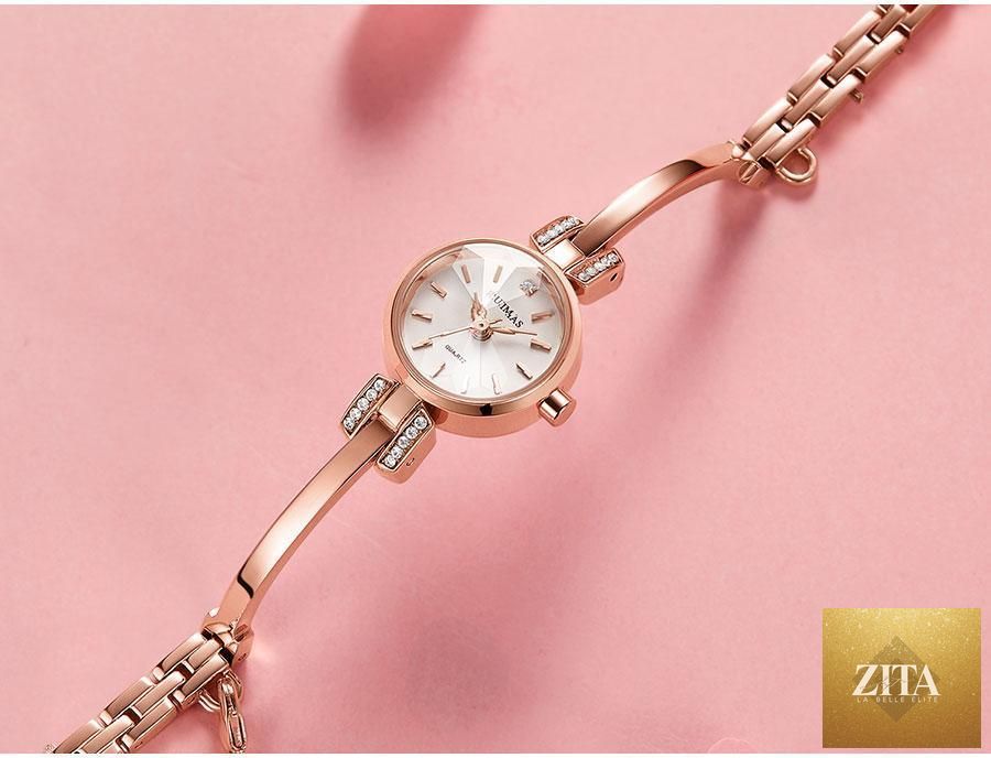Silver women's bracelet watch by Stevvex with a mini round face, modern design, quartz movement, waterproof, and stylish accessories.