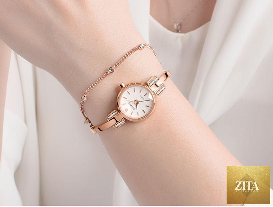 Silver women’s modern bracelet wristwatch by Stevvex featuring a mini round dial, quartz movement, and waterproof design.