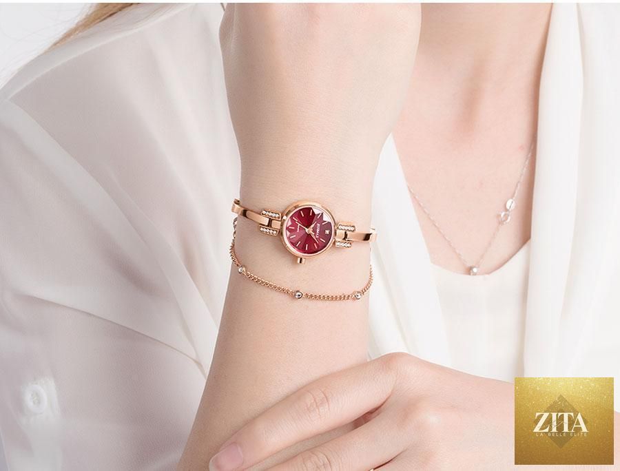 Silver women's modern bracelet wristwatch with mini round face, quartz movement, waterproof design by Stevvex.