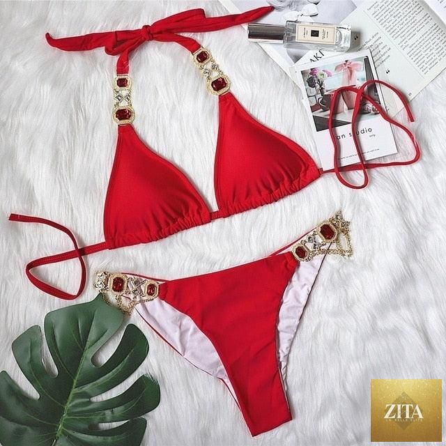 Luxury purple crystal diamond bikini set for women, featuring halter top, low waist, tie side bottoms, and rhinestone embellishments.