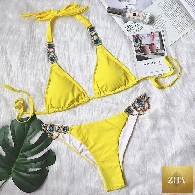 Luxury purple crystal diamond bikini set by Stevvex, featuring halter style, low waist, rhinestones, and tie side design for women.