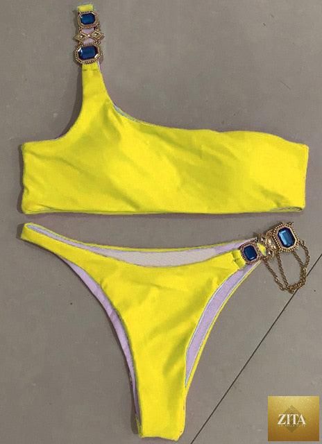Luxury purple crystal diamond bikini set for women, halter style with rhinestones, low waist, tie side swimwear by Stevvex.