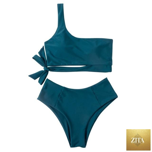 Women Stevvex leopard print bikini with one shoulder top and high waist bottoms, ideal for summer beachwear and swimming.