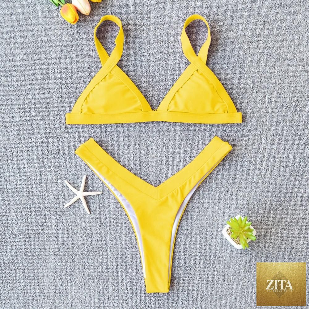 Stevvex solid bikini swimsuit for women with high-leg cut, push-up top, halter neck, patchwork design, perfect for beach and swimming.