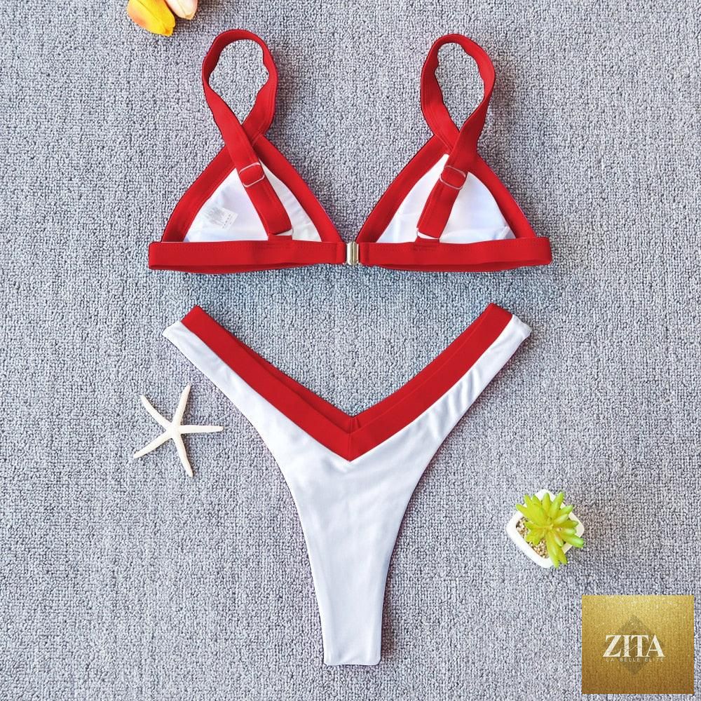 Stevvex solid bikini swimsuit for women featuring push-up design, high-leg cut, halter style, patchwork details, perfect for beach and swimming.