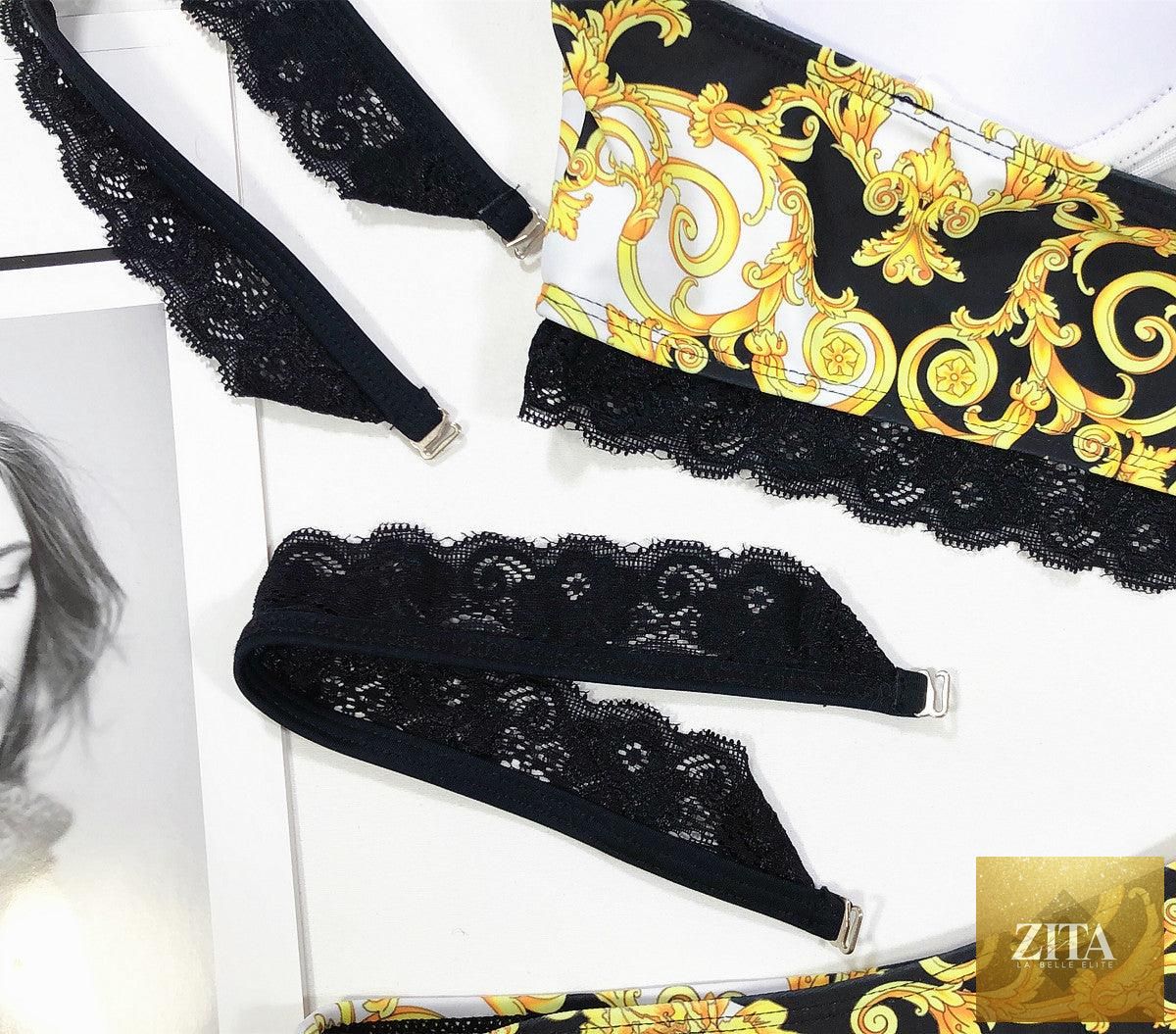 Vintage black print women's bikini set with high waist bottoms, halter top, lace straps, padded bra, and stylish beachwear design.