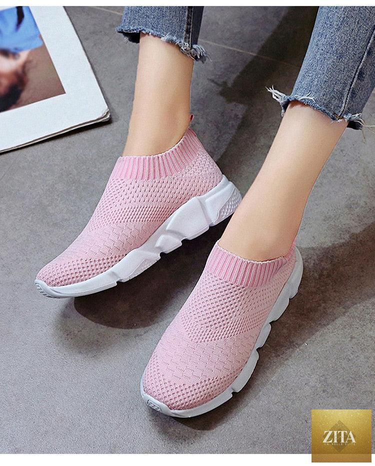 Women slip-on white sneakers by Stevvex with breathable mesh, lightweight vulcanize shoes for casual walking and light workouts.
