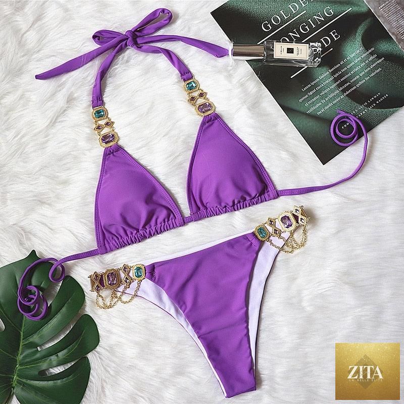Luxury purple crystal diamond bikini set featuring halter top, low waist, tie-side bottoms, and rhinestone embellishments for women.