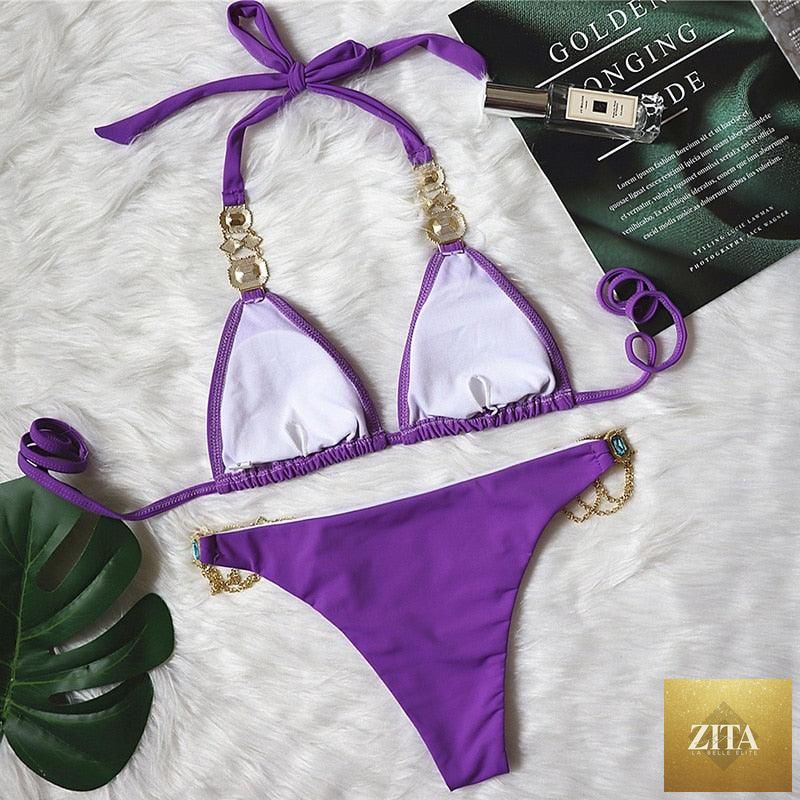 Luxury purple crystal diamond bikini set for women, halter style with low waist and tie side, featuring rhinestones and elegant swimwear design.