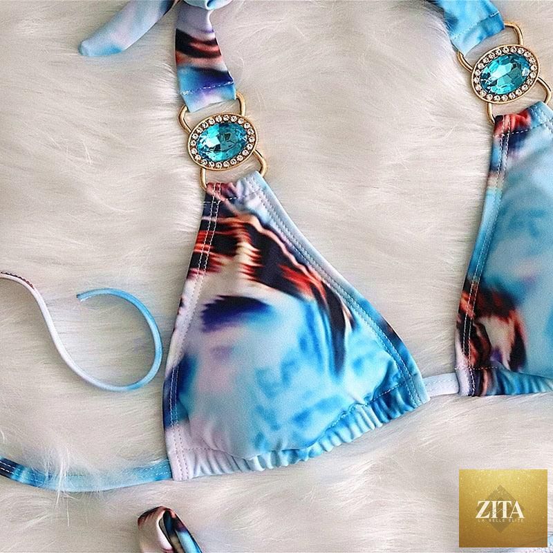 Stevvex luxury purple crystal diamond bikini set with halter top and low waist, featuring rhinestone details and tie side bottoms.