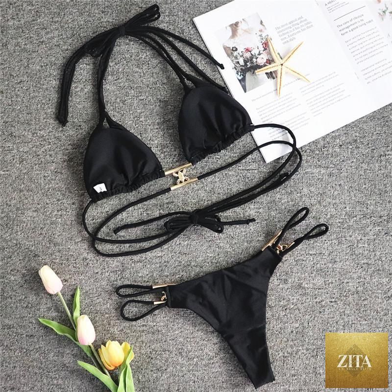 Luxury purple crystal diamond bikini set featuring halter neck, low waist, rhinestone accents, tie side bottoms, women's swimwear by Stevvex.