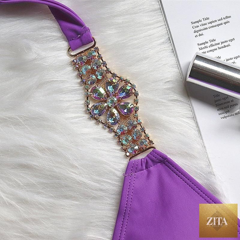 Luxury purple crystal diamond bikini set for women, featuring halter top, low waist, tie sides, and rhinestone details.