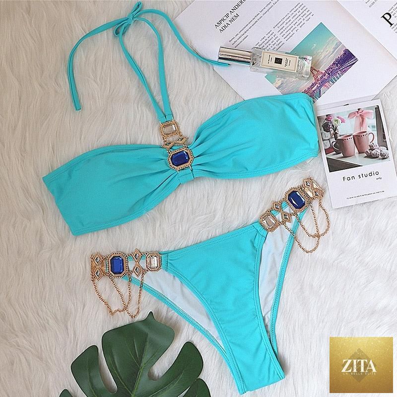 Luxury purple halter crystal diamond bikini set for women, featuring rhinestone accents, low waist, and tie side design by Stevvex.