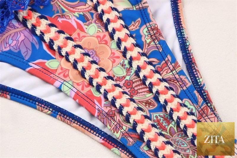 Vintage print female bikini by Stevvex with ruffle details, high cut, halter neck, triangle top, two-piece swimwear for women.