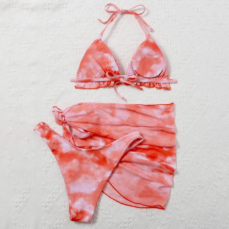 Stevvex 3-piece women's bikini set with high cut, halter top, wrap skirt, lace-up details, and triangle backless design.