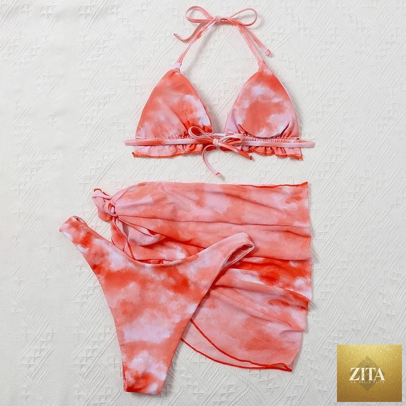 Stevvex 3-piece women's bikini set with high cut, halter top, wrap skirt, lace-up details, and triangle backless design.