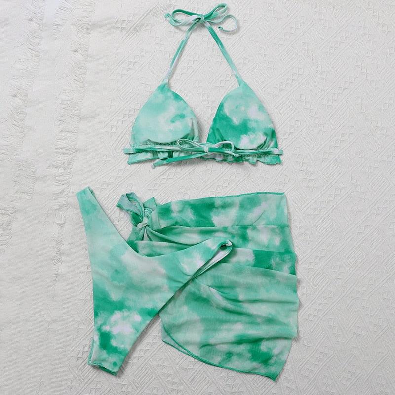 Stevvex 3-piece women's bikini set with high cut bottoms, halter top, wrap skirt, lace-up details, backless design, triangle swimsuit