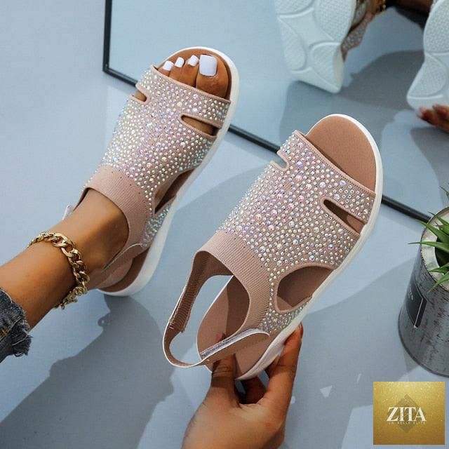 Blue Stevvex women's summer sandals with buckle strap, open toe, slip-on flat design, perfect for casual beach or dressy summer wear.