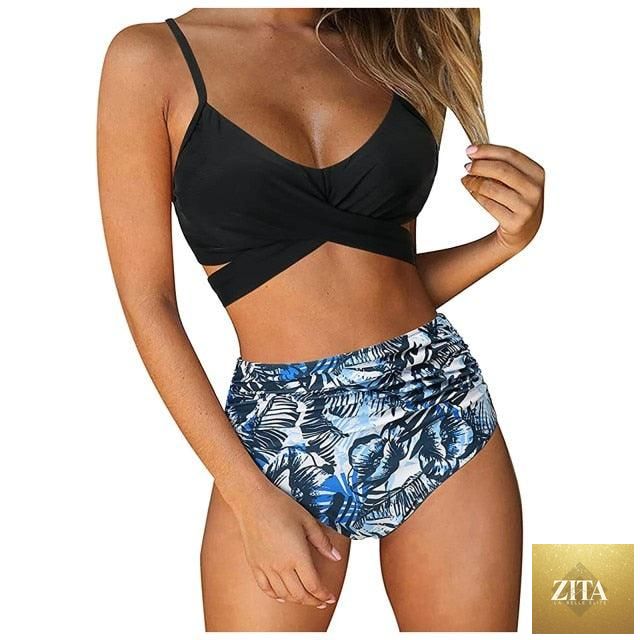 Stevvex modern floral two-piece bikini set featuring high waist, crisscross design, flower print, and matching swim shorts for women.