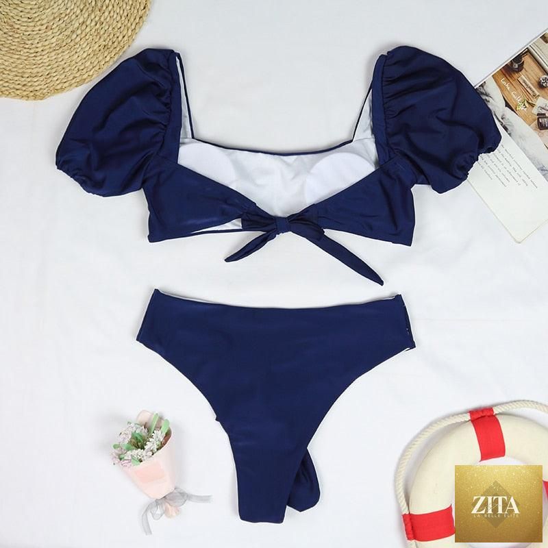 Stevvex two-piece women's bikini set with high waist, puff sleeves, solid color, backless design, perfect for summer beachwear.