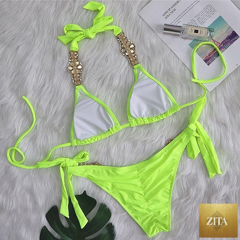 Luxury purple Stevvex bikini set with halter top, rhinestones, and low waist tie-side design for women’s swimwear and crystal diamond sparkle.